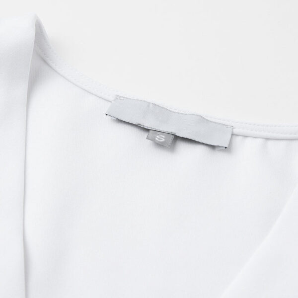 Blusa de manga larga con acabados redondos y botones A&P. - Imagen 5